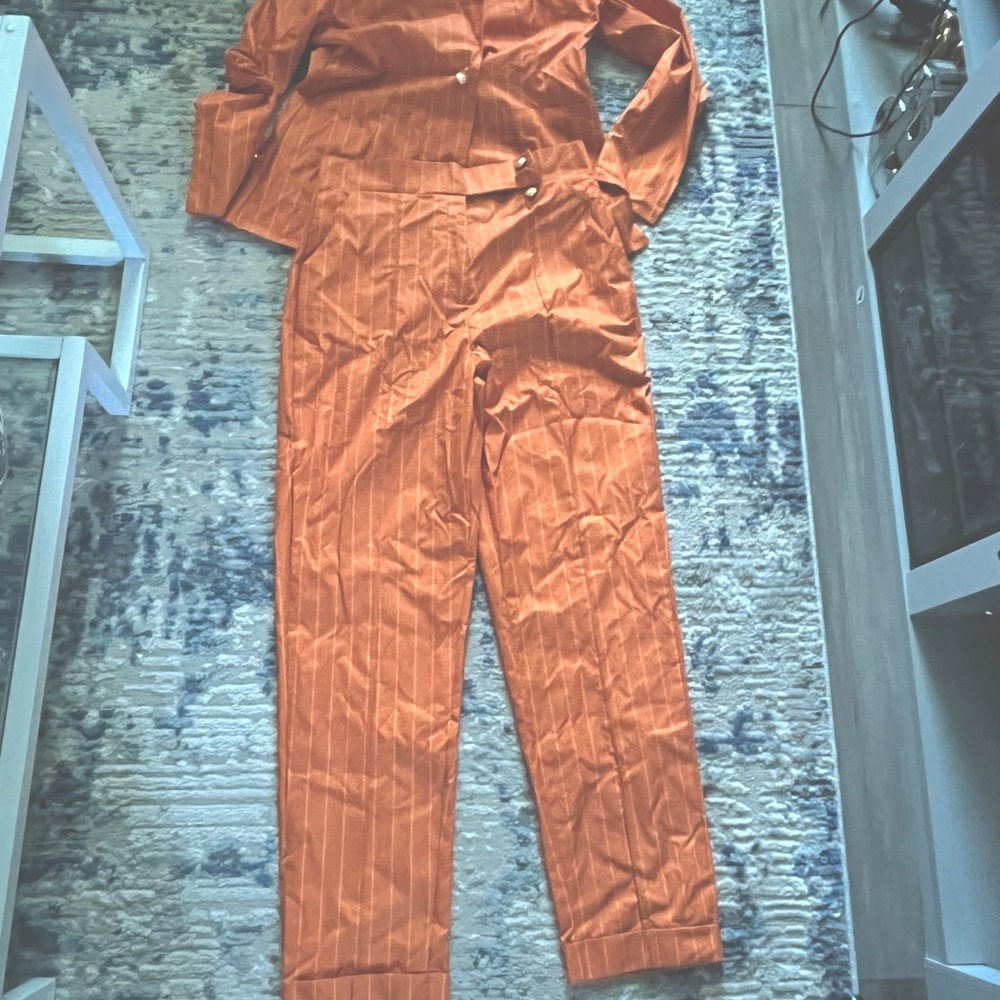 Orange 2 piece suit size xl brand new